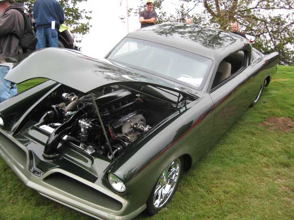 This is a 1953 Studebaker Starlight Coupe with some very slick custom work