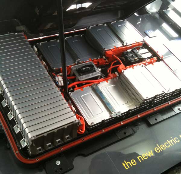 The Leaf's laminated lithium-ion battery pack is sandwiched on the floor of 