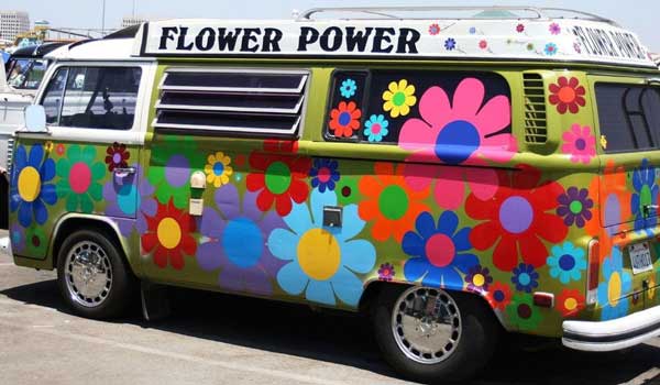 An old Hippiestyled VW Camper Gotta love the flower power
