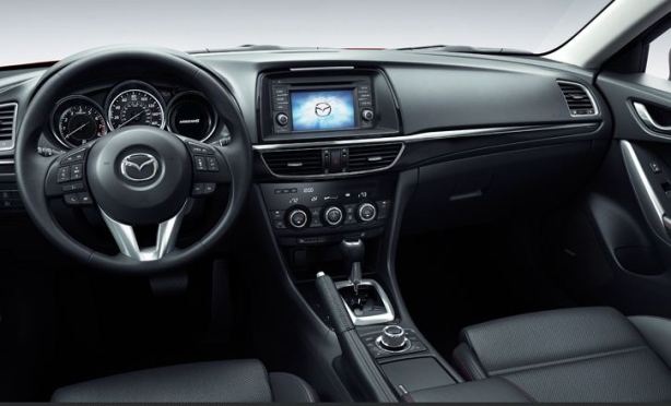 Mazda only has two choices for the interior: Somber Black or Bright Almond (which looks white) . Something in between like grey or tan/saddle would be nice. 