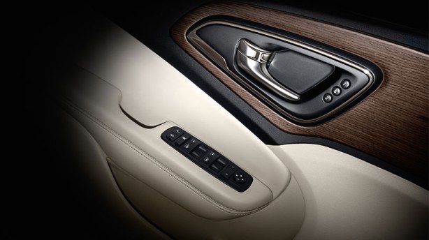This is a detail of the interior door trim/pull handle. The memory power seats are an upgrade to the top-of-the-line 200C.  The simulated open pore wood trim is nicely done.